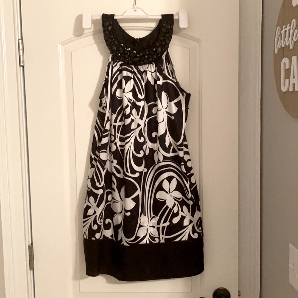 Embellished black neck design dress. Barely worn.